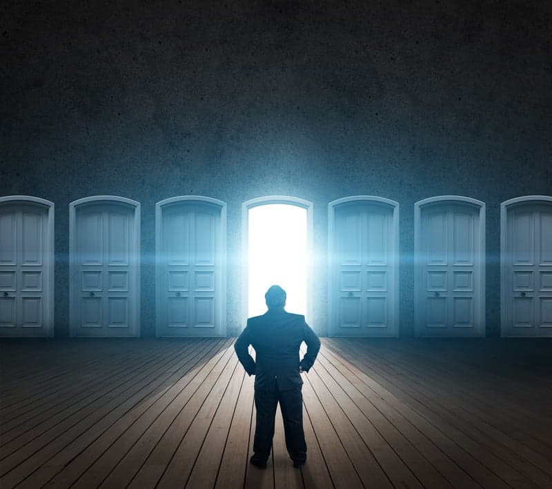 Person standing in front of a open door